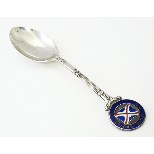 511 - A silver souvenir teaspoon with enamel detail to finial titled S. S. Kenya Castle, hallmarked Birmin... 
