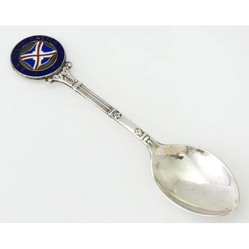 511 - A silver souvenir teaspoon with enamel detail to finial titled S. S. Kenya Castle, hallmarked Birmin... 