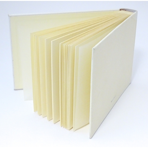 514 - A photograph album with embossed silver mount hallmarked Sheffield 2000, maker Carrs of Sheffield. B... 