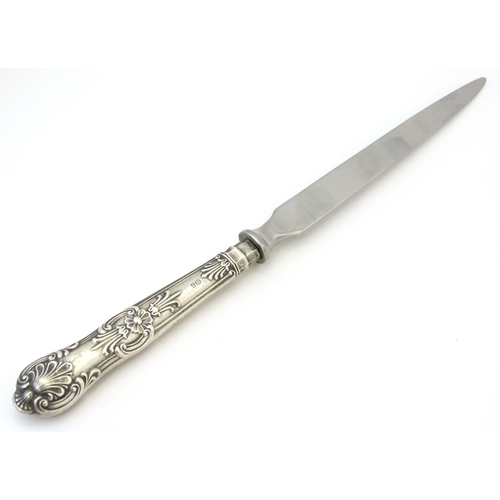 515 - A silver handled paper knife / letter opener. Approx. 8 1/4