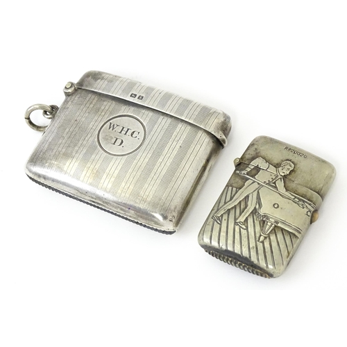 359 - A silver vesta case with engine turned decoration, hallmarked Birmingham 1917, maker Henry Matthews.... 