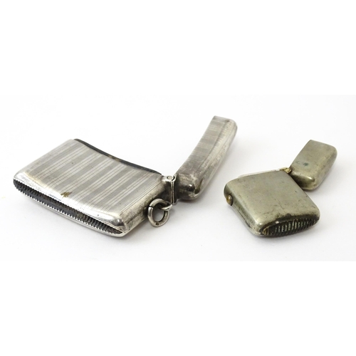 359 - A silver vesta case with engine turned decoration, hallmarked Birmingham 1917, maker Henry Matthews.... 