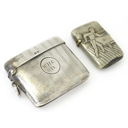 359 - A silver vesta case with engine turned decoration, hallmarked Birmingham 1917, maker Henry Matthews.... 