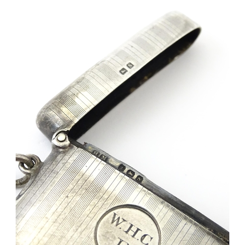 359 - A silver vesta case with engine turned decoration, hallmarked Birmingham 1917, maker Henry Matthews.... 
