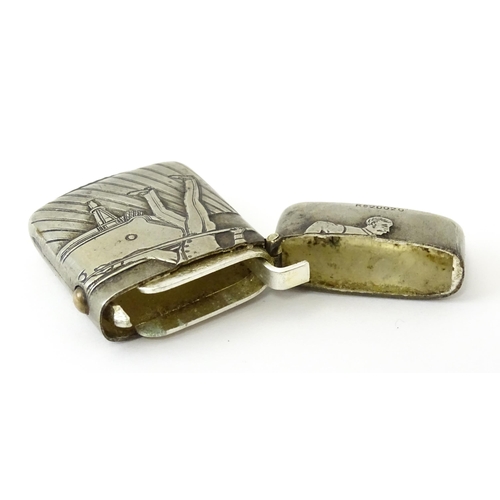 359 - A silver vesta case with engine turned decoration, hallmarked Birmingham 1917, maker Henry Matthews.... 