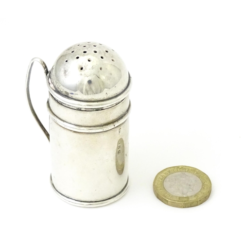 360 - A Victorian silver pepperette modelled as a flour shaker, hallmarked Birmingham 1898. Approx. 2 1/2