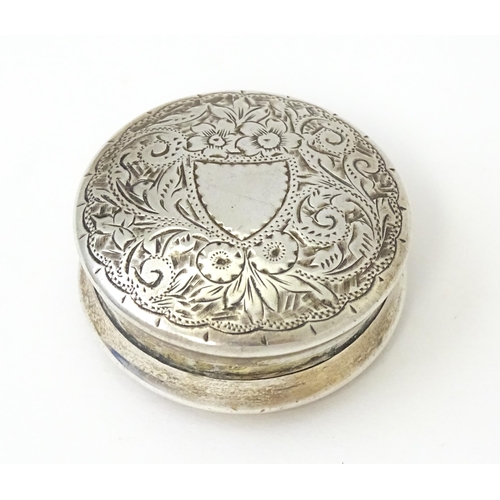 361 - A Victorian silver pill box with engraved decoration hallmarked Birmingham 1895, maker Hilliard & Th... 