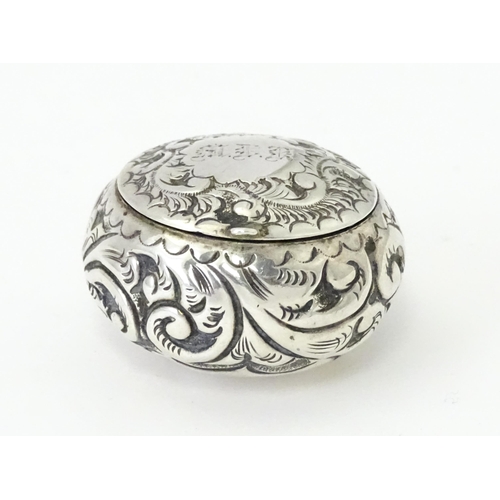 364 - A Victorian silver pill pot with embossed decoration, hallmarked Birmingham 1896, maker Cornelius De... 