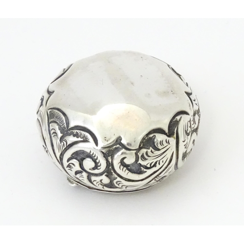 364 - A Victorian silver pill pot with embossed decoration, hallmarked Birmingham 1896, maker Cornelius De... 