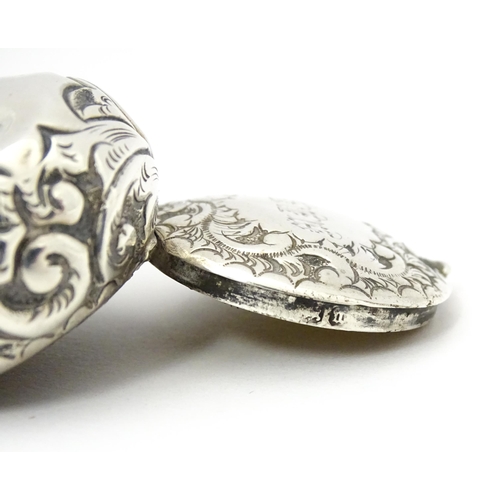 364 - A Victorian silver pill pot with embossed decoration, hallmarked Birmingham 1896, maker Cornelius De... 