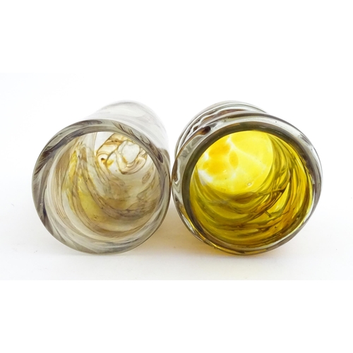 211 - Two Mdina glass vases, one with trailed detail and signed under. The other of tall cylindrical form.... 