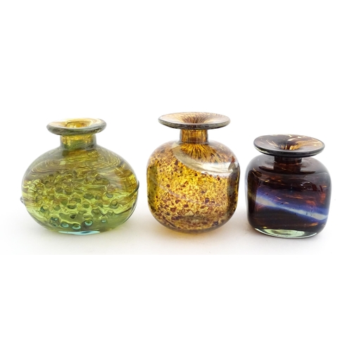 212 - A Mdina glass squat vase, signed under. Together with two further art / studio glass vases, one with... 