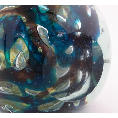 213 - A Mdina glass vase of squared form. Signed Mdina Glass under and dated 1975. Approx. 7
