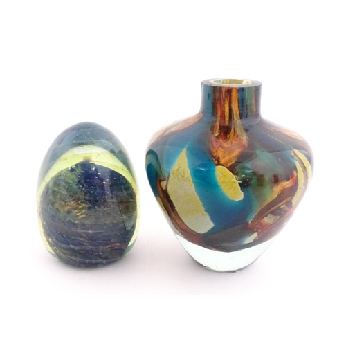 215 - A Mdina glass paperweight signed under. Together with a Mdina glass Tiger pattern vase, Unsigned. Th... 