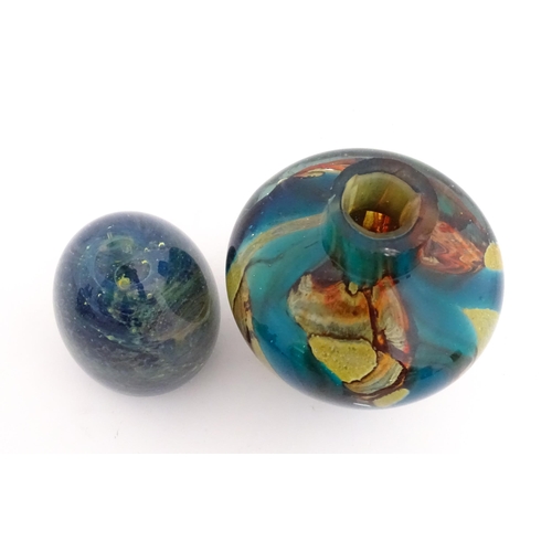 215 - A Mdina glass paperweight signed under. Together with a Mdina glass Tiger pattern vase, Unsigned. Th... 