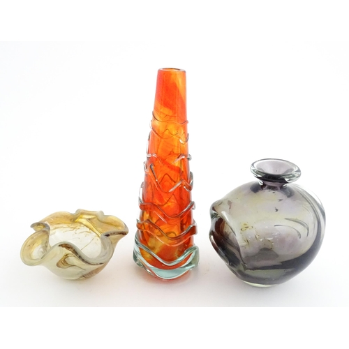 216 - Three Mdina glass items comprising an orange Helter Skelter style vase, a pulled ear vase and an Ear... 