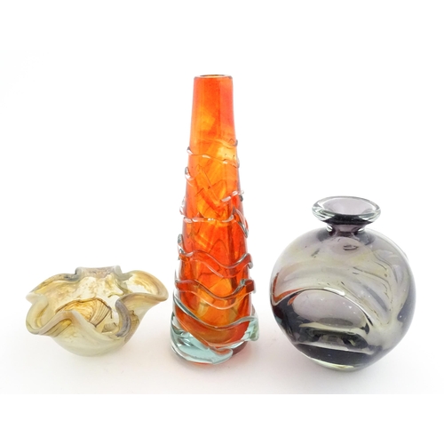 216 - Three Mdina glass items comprising an orange Helter Skelter style vase, a pulled ear vase and an Ear... 