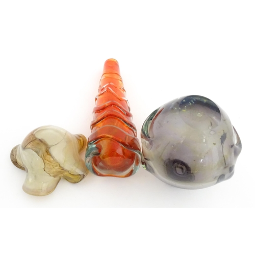 216 - Three Mdina glass items comprising an orange Helter Skelter style vase, a pulled ear vase and an Ear... 