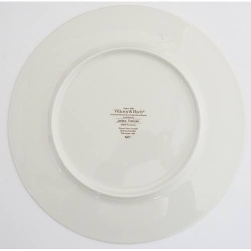 201 - Twelve Villeroy & Boch chargers / collector's plates from the Jardins Francais series. Marked under.... 