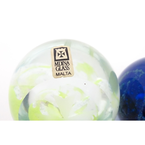 224 - Maltese glass :  A quantity of assorted glass paperweights, some with stylised sea urchin decoration... 