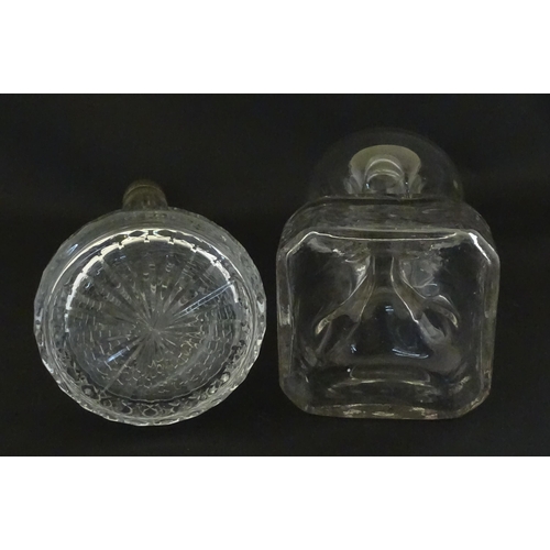 230 - Two decanters, one with Russian silver collar, the other with pinch detail. The tallest approx 13