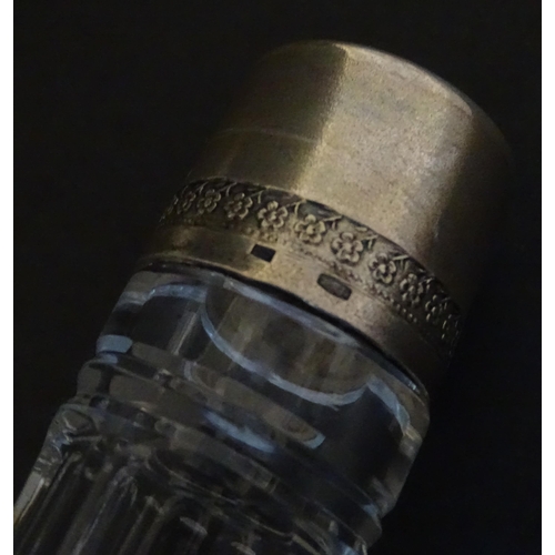 230 - Two decanters, one with Russian silver collar, the other with pinch detail. The tallest approx 13