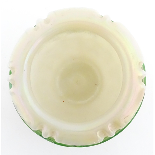 236 - A Bohemian Art Nouveau style glass bowl, the iridescent body with green trailed detail. Approx 3 3/4... 