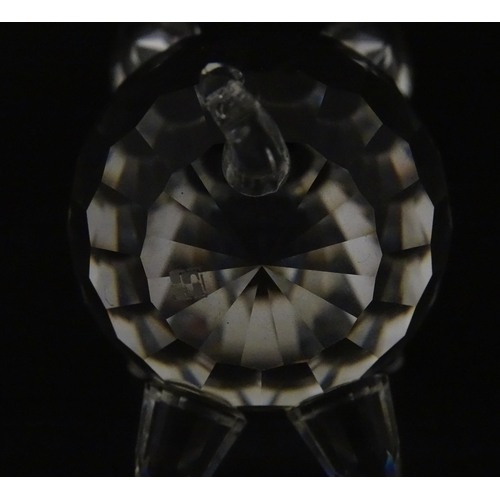 304 - Four Swarovski crystal models of pigs. Largest approx. 2 3/4