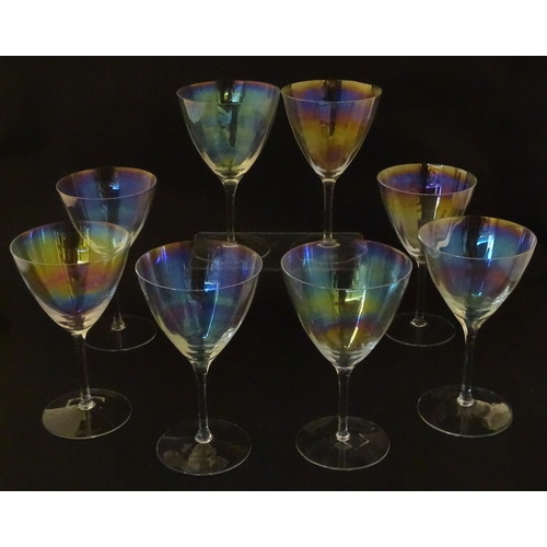 311 - Fifteen iridescent glass wine glasses. Largest approx. 7