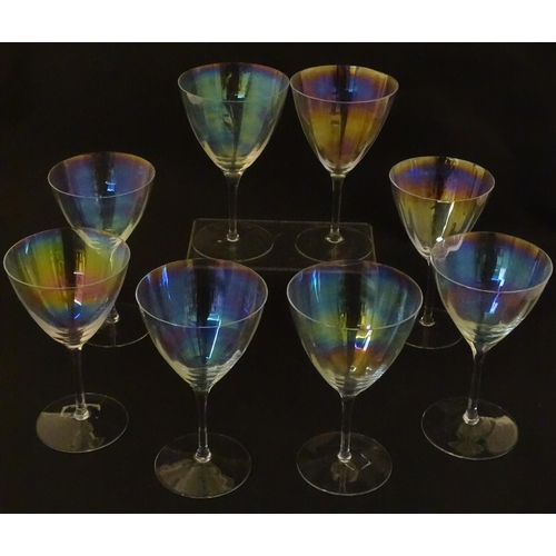 311 - Fifteen iridescent glass wine glasses. Largest approx. 7