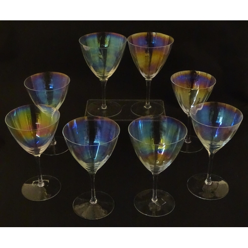 311 - Fifteen iridescent glass wine glasses. Largest approx. 7
