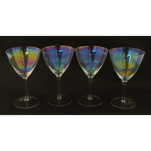 311 - Fifteen iridescent glass wine glasses. Largest approx. 7