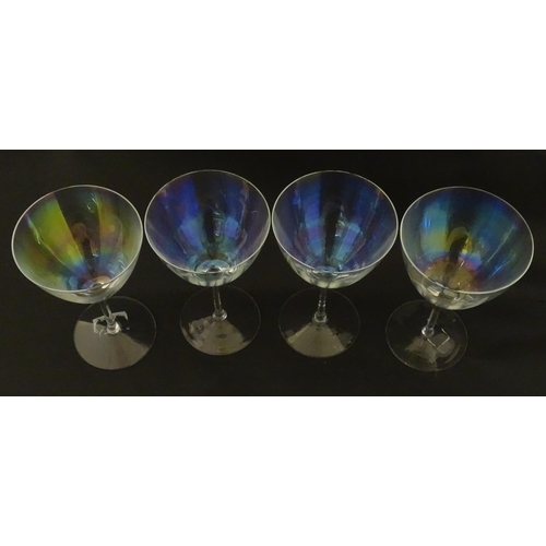 311 - Fifteen iridescent glass wine glasses. Largest approx. 7