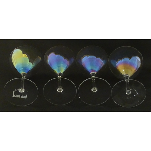 311 - Fifteen iridescent glass wine glasses. Largest approx. 7