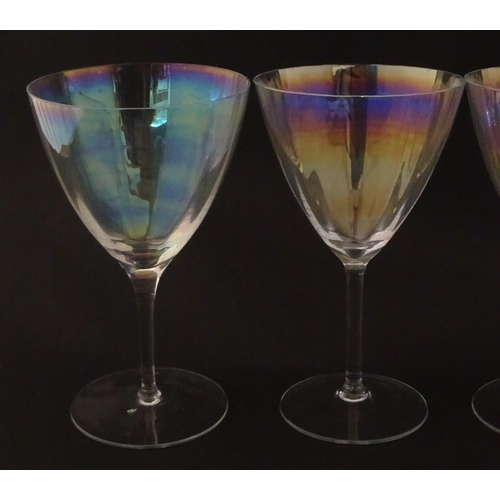 311 - Fifteen iridescent glass wine glasses. Largest approx. 7