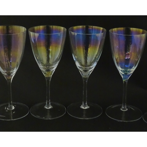 311 - Fifteen iridescent glass wine glasses. Largest approx. 7