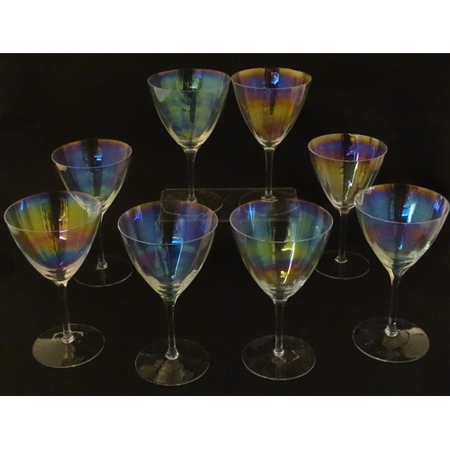 311 - Fifteen iridescent glass wine glasses. Largest approx. 7