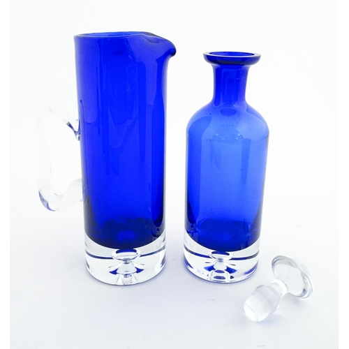 314 - Two Polish Krosno blue glass items comprising a lemonade / water jug, and a decanter. Decanter appro... 