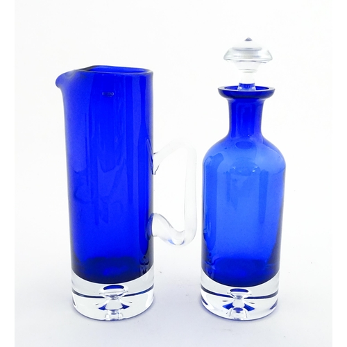 314 - Two Polish Krosno blue glass items comprising a lemonade / water jug, and a decanter. Decanter appro... 