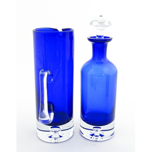 314 - Two Polish Krosno blue glass items comprising a lemonade / water jug, and a decanter. Decanter appro... 