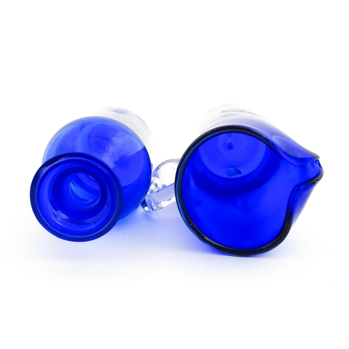 314 - Two Polish Krosno blue glass items comprising a lemonade / water jug, and a decanter. Decanter appro... 