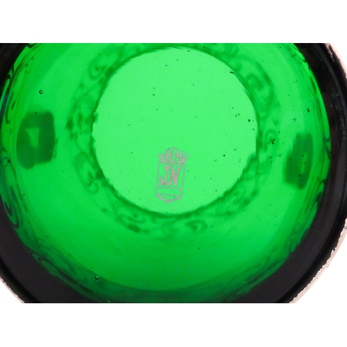 315 - A Spanish green glass punch bowl with ladle and six punch cups with silvered overlay detail. Marked ... 