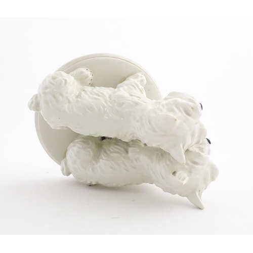 186 - A Czech model of two terrier dogs, by Amphora. Marked under and numbered 8351. Approx. 7