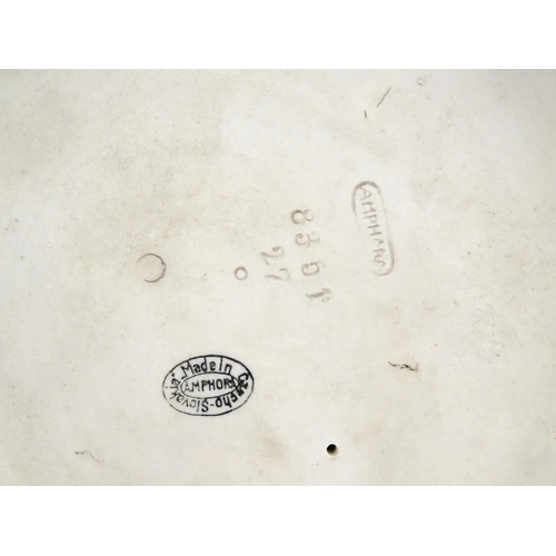 186 - A Czech model of two terrier dogs, by Amphora. Marked under and numbered 8351. Approx. 7