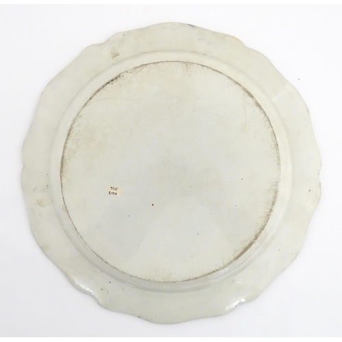 187 - A blue and white pearlware feathered edge charger with floral and foliate brushwork detail. Approx. ... 
