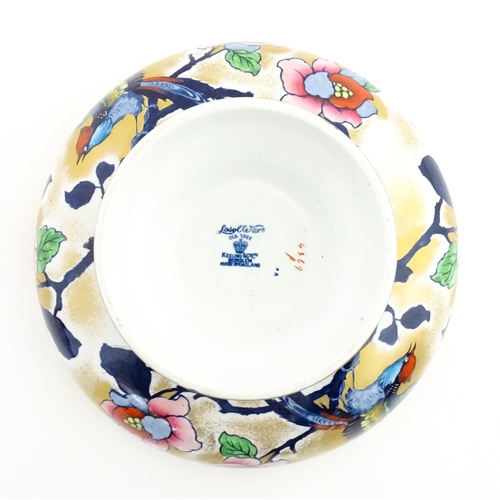 192 - Assorted ceramics to include a Losol Ware footed bowl decorated in the Old Tree pattern, a German pl... 