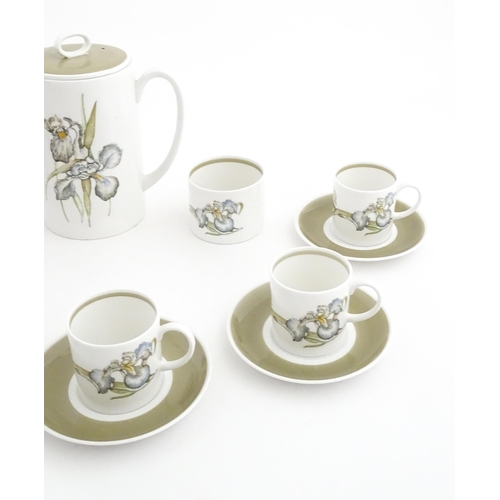 206 - A Susie Cooper coffee set decorated in the Iris pattern comprising coffee pot, sugar bowl, milk jug,... 