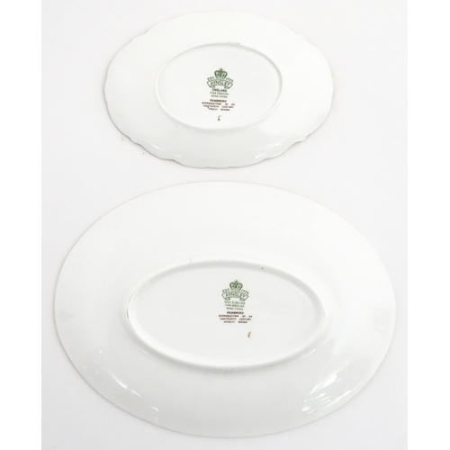 207 - A quantity of Aynsley dinner wares decorated in the Pembroke pattern to include plates, soup bowls a... 