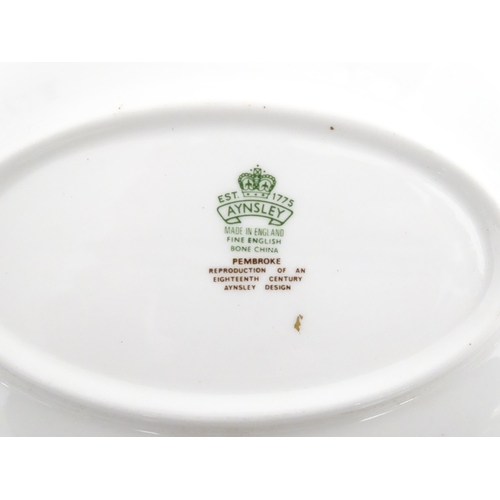 207 - A quantity of Aynsley dinner wares decorated in the Pembroke pattern to include plates, soup bowls a... 