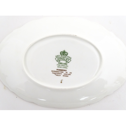 207 - A quantity of Aynsley dinner wares decorated in the Pembroke pattern to include plates, soup bowls a... 